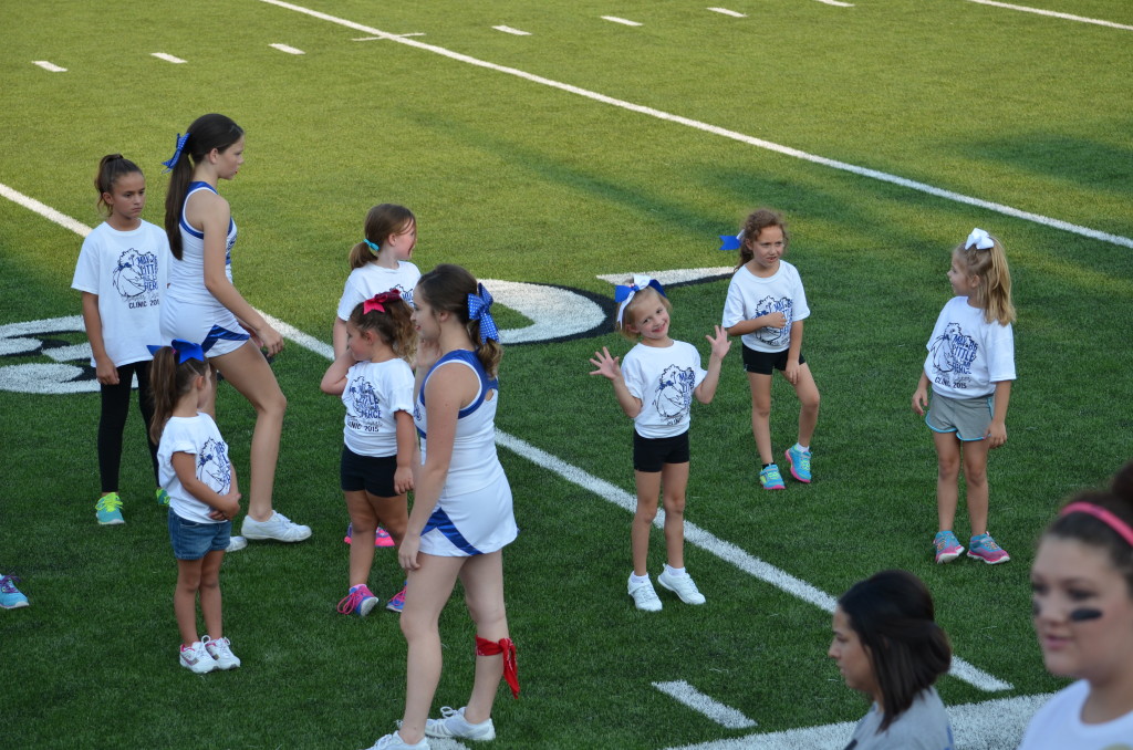 8-29-15 aiden and annslee cheer at varsity game 011