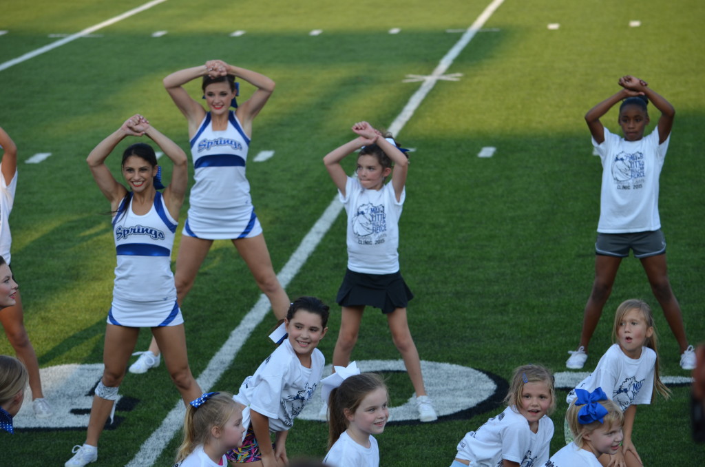 8-29-15 aiden and annslee cheer at varsity game 015