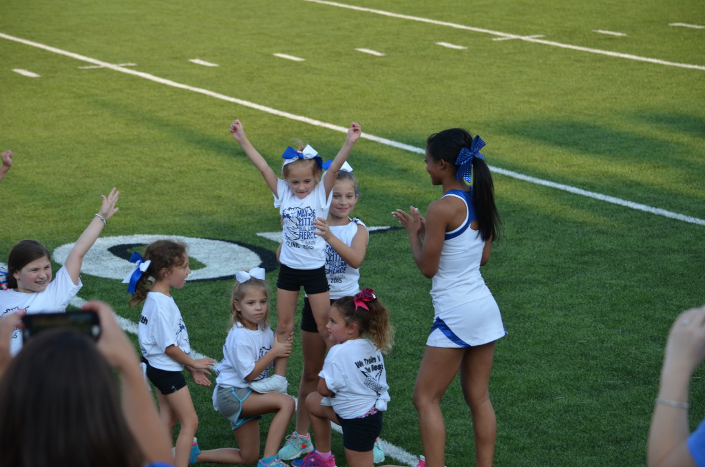 8-29-15 aiden and annslee cheer at varsity game 021