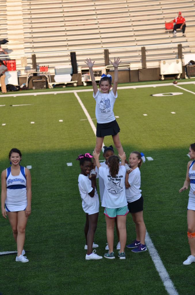 8-29-15 aiden and annslee cheer at varsity game 023